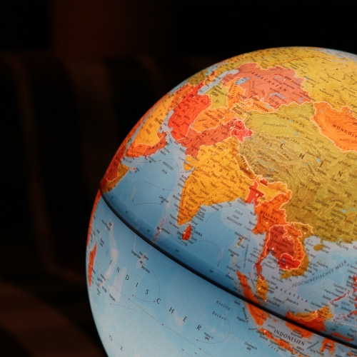 a close up of a globe on a table